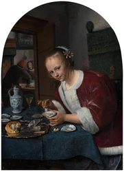 Meisje dat oesters eet