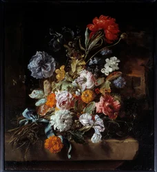 Boeket bloemen op een stenen bank