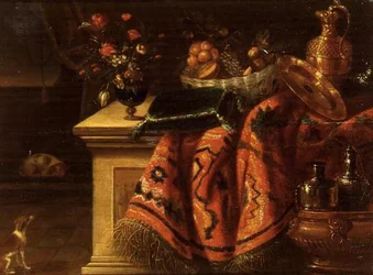 Een stilleven met een vaas bloemen, fruit in een kom, een vergulde zilveren kan en bord & een kussen