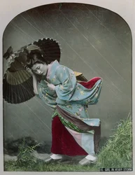 Jong Japans meisje in de regen, ca. 1900