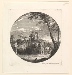De ruïnes op de achtergrond