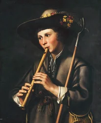 Een herder die op de pijpen speelt
