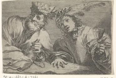 Oude en jonge man aan een tafel