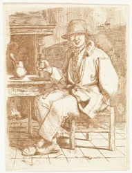 Lachende man met glas in de hand