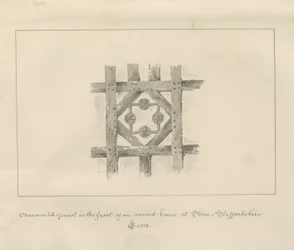 Steen - Sierpaneel op een oud huis: sepia was tekening