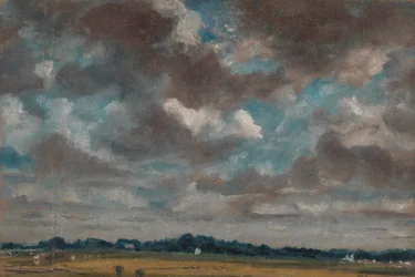 Uitgestrekt landschap met grijze wolken
