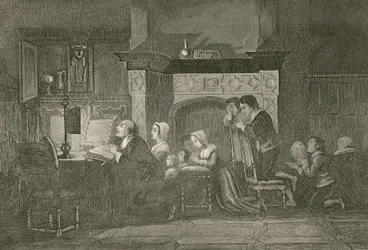 De kruidenier en zijn familie bij het gebed