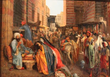 Frans: La Rue et la mosquée al-Ghouri au Caire Straatbeeld bij de El Ghouri Moskee in Caïro