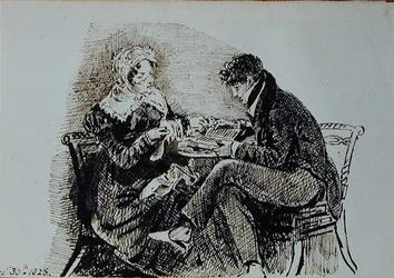 Man en vrouw lezen aan een tafel