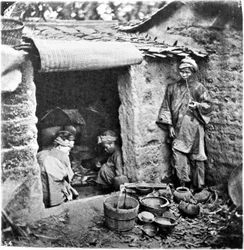 China, een eenvoudige familie, ca. 1870 (foto)
