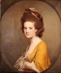 Portret van Dorothy Hodges, halve lengte, in een gele jurk