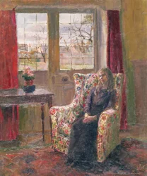 In de fauteuil bij het raam