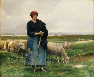 Een herderin met haar kudde