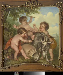 Drie kinderen spelend met een bok