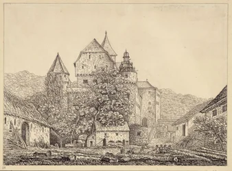 Kasteelachtige groep gebouwen in een berglandschap
