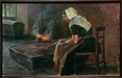 Vrouw bij open haard