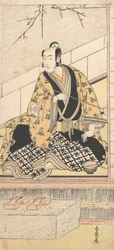 De acteur Matsumoto Koshiro IV zittend in een buitenkamer