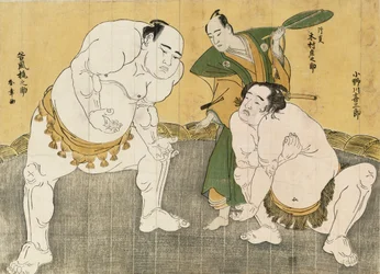 Onagawa Kisaburo en Tanikaze Kajinosuke voeren de Shiriki uit in de Dohyo, gescheidsrechterd door Kimura Shonosuke