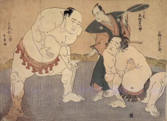Onagawa Kisaburo en Tanikaze Kajinosuke voeren de Shiriki uit in de Dohyo, gescheidsrechterd door Kimura Shonosuke