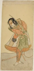 De Acteur Nakamura Nakazo I als Tezuka no Taro Mitsumori Vermomd als de Aaptrainer Tonkichi Tochibei, in het stuk Soga Moyo Aigo no Wakamatsu, uitgevoerd in het Nakamura Theater in de eerste maand, 1769