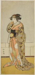 De acteur Yamashita Kinsaku II als Lady Kikusui (Kikusui Gozen) (?) in het stuk Kaeribana Eiyu Taiheiki (?), opgevoerd in het Nakamura Theater (?) in de elfde maand, 1779 (?)