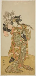 De acteur Yamashita Kinsaku II als Odai, een Eboshi (hoed) verkoper, in het stuk Hana-zumo Genji Hiiki, uitgevoerd in het Nakamura Theater in de elfde maand, 1775