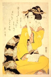 Een geisha die een boek leest