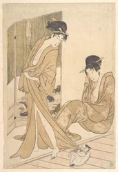 Twee jonge vrouwen gewikkeld in yukata na een bad