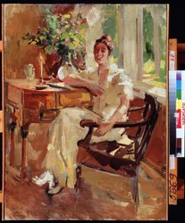 Een vrouw in een fauteuil