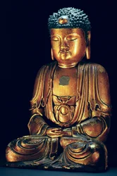 Een figuur van de zittende Boeddha (goudlak)