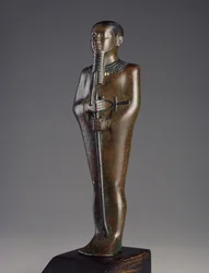 Statuette van de god Ptah (brons met zwart pigment en ingelegd zilver en goud)