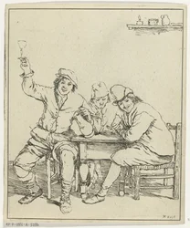 Drie mannen aan tafel roken en drinken