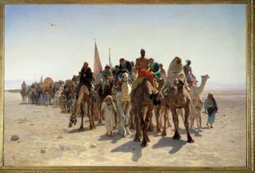 Pelgrims op weg naar Mekka Karavaan van reizigers op kamelen in de woestijn