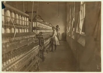 Hattie Hunter, een spinner in Lancaster Cotton Mills, South Carolina waar ze al 3 jaar werkt