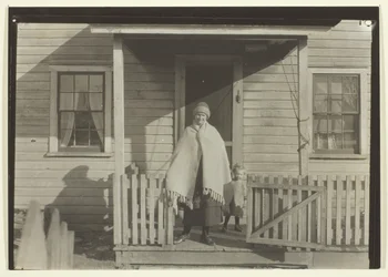 Vrouw, kind en huis van een kolenmijnwerker uit Pennsylvania