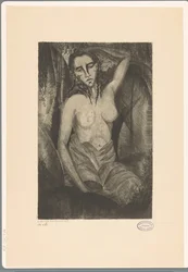 Zittende vrouw