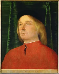 Jonge man in een rood jasje (schilderij op lindehout)