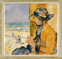 Vrouw en kinderen op het strand