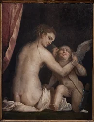 Venus blinddoekt Cupido