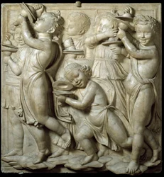 Paneel van de Cantoria of tribune van zangers: kind dat cymbalen speelt. Hoog marmeren reliëf door Luca della Robbia (ca. 1400-1482) 1431-1438