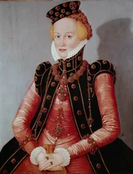 Portret van een jonge vrouw rijkelijk gekleed, met hoed en juwelen