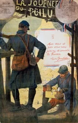 Twee Franse soldaten doorzoeken zorgpakketten van thuis.