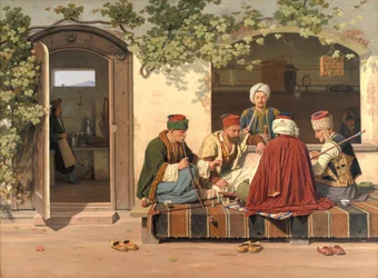 Een groep schakers buiten een Turks koffiehuis en barbershop