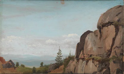 Noors landschap met rotsen op de voorgrond