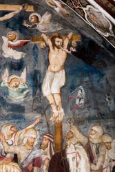 De onberouwvolle dief, gekruisigd met Jezus, zijn ziel wordt uit zijn mond getrokken door een demon. Voorstelling van de slechte dief genaamd Gesmas of Gestas. Fresco door de meester van de Sacro Speco. 14e eeuw. Bovenkerk. Klooster van Sint Benedetto (Sac