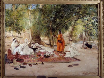 Orientalisme: de maaltijd van gastvrijheid. Scène uit het Arabische leven in de oase van Chelma nabij Biskra, Algerije