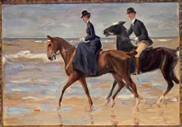 Ruiter en ruiter op het strand