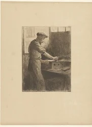 Drukker aan het werk in atelier