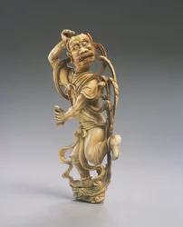Een figuur van Kui xing