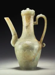 Een late Ming celadon jade kan en deksel
